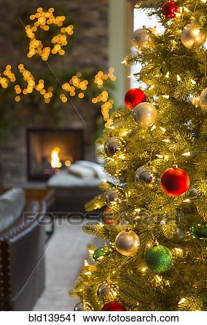 Close up of Christmas tree in living room View Large Photo Image Stock Image - Close up of Christmas tree in living room. Fotosearch