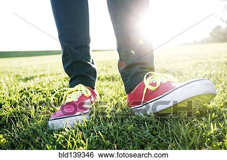 Close up of Hispanic woman's sneakers View Large Photo Image Stock Photograph - Close up of Hispanic woman's sneakers. Fotosearch