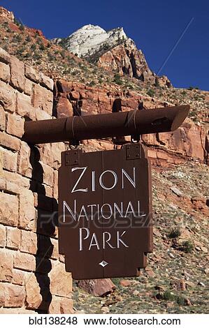 Close up of Zion National Park sign on stone wall, Utah, United States View Large Photo Image Stock Photo - Close up of Zion National Park sign on stone wall, Utah, United States. Fotosearch