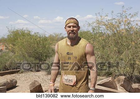 Dirty Caucasian racer in remote landscape View Large Photo Image Stock Image - Dirty Caucasian racer in remote landscape. Fotosearch
