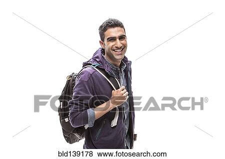 Indian student carrying backpack View Large Photo Image Stock Photo - Indian student carrying backpack. Fotosearch