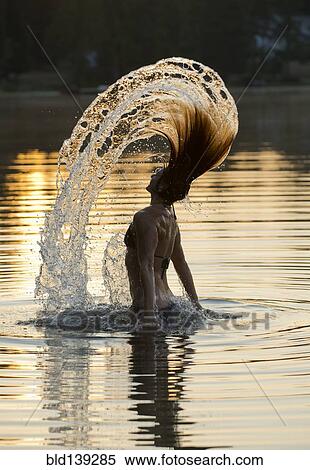 Korean woman flipping hair in lake View Large Photo Image Stock Photography - Korean woman flipping hair in lake. Fotosearch