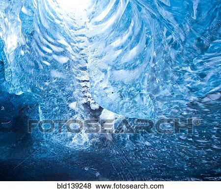 Light shining into ice cave View Large Photo Image Stock Photo - Light shining into ice cave. Fotosearch