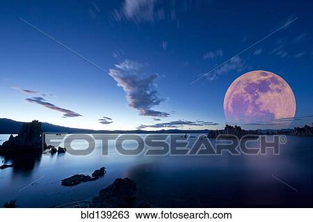 Moon over rock formation at Mono Lake, California, United States View Large Photo Image Stock Image - Moon over rock formation at Mono Lake, California, United States. Fotosearch