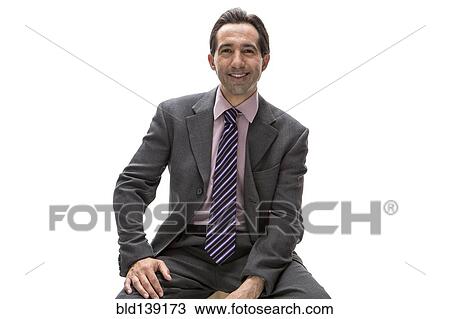 Stock Image - Pacific Islander businessman smiling. Fotosearch