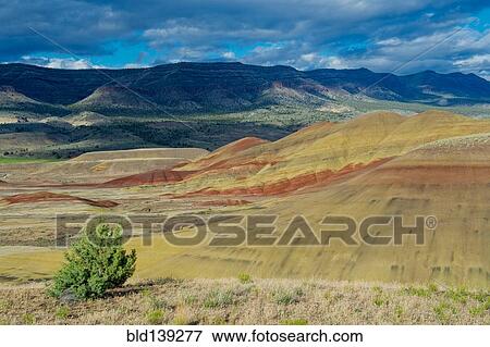 Painted hills in desert landscape, Bend, Oregon, United States View Large Photo Image Stock Photo - Painted hills in desert landscape, Bend, Oregon, United States. Fotosearch
