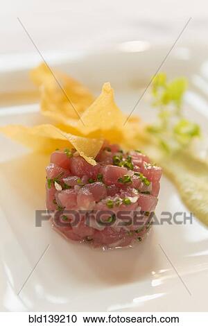 Stock Image - Plate of fresh food and chips. Fotosearch