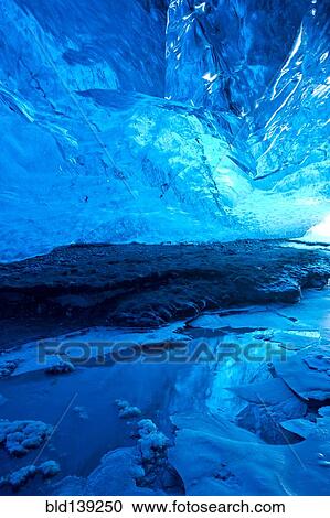 Pool of water in ice cave View Large Photo Image Stock Image - Pool of water in ice cave. Fotosearch