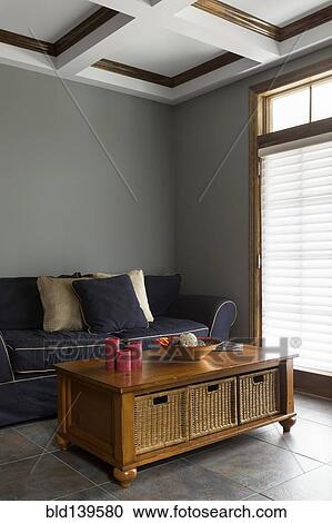 Stock Image - Sofa and coffee table in living room. Fotosearch