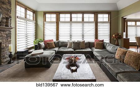 Stock Photo - Sofa and coffee table in living room. Fotosearch