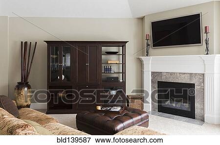 Sofa, television and cabinets in modern living room View Large Photo Image Stock Photo - Sofa, television and cabinets in modern living room. Fotosearch