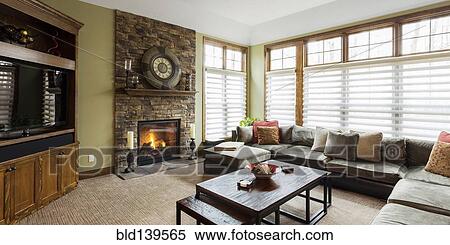 Sofa, television and fireplace in living room View Large Photo Image Stock Photography - Sofa, television and fireplace in living room. Fotosearch