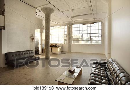 Sofas in living room of loft View Large Photo Image Stock Image - Sofas in living room of loft. Fotosearch
