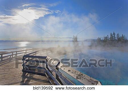 Steam rising from hot springs, Yellowstone National Park, Wyoming, United States View Large Photo Image Stock Image - Steam rising from hot springs, Yellowstone National Park, Wyoming, United States. Fotosearch