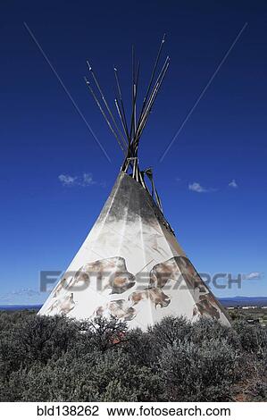Stock Image - Teepee in remote field. Fotosearch