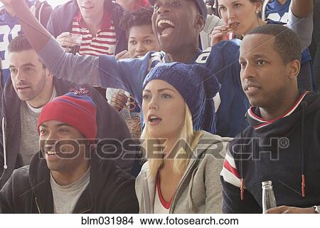 Fans watching American football game View Large Photo Image Picture - Fans watching American football game. Fotosearch