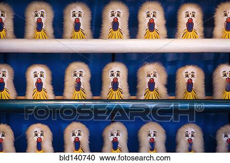 Amusement park shooting game targets on shelves View Large Photo Image Stock Image - Amusement park shooting game targets on shelves. Fotosearch