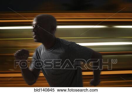 Stock Photography - Blurred view of Black man running. Fotosearch