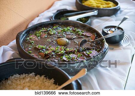 Bowls of traditional beans and rice on buffet table View Large Photo Image Stock Photograph - Bowls of traditional beans and rice on buffet table. Fotosearch