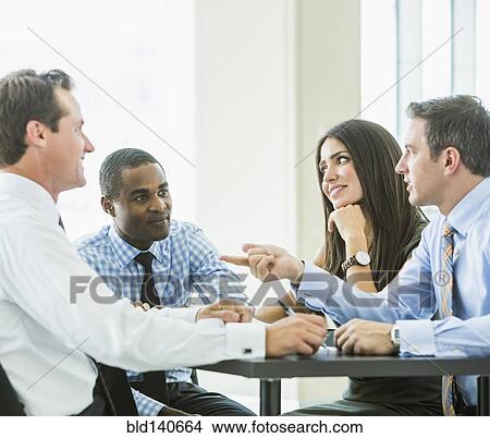 Business people talking in meeting View Large Photo Image Picture - Business people talking in meeting. Fotosearch