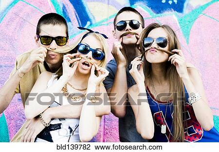 Caucasian couples making faces View Large Photo Image Stock Image - Caucasian couples making faces. Fotosearch
