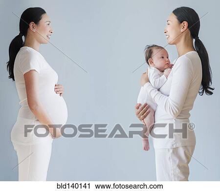Double exposure of pregnant Asian mother before and after birth of baby View Large Photo Image Stock Image - Double exposure of pregnant Asian mother before and after birth of baby . Fotosearch