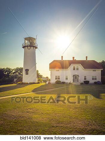 Home and lighthouse on rural lawn View Large Photo Image Stock Photo - Home and lighthouse on rural lawn. Fotosearch