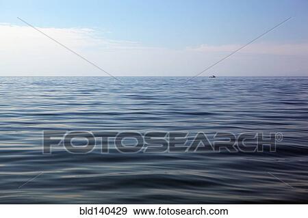 Lake under blue sky View Large Photo Image Stock Photo - Lake under blue sky. Fotosearch