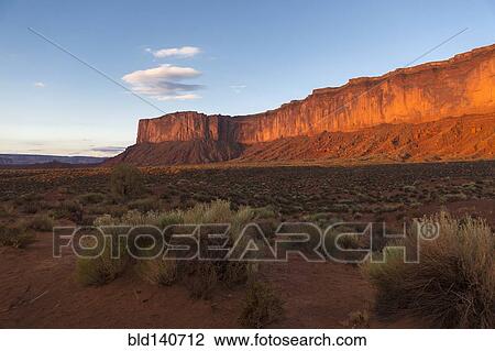 Rock formations overlooking desert, Monument Valley, Utah, United States View Large Photo Image Stock Image - Rock formations overlooking desert, Monument Valley, Utah, United States. Fotosearch