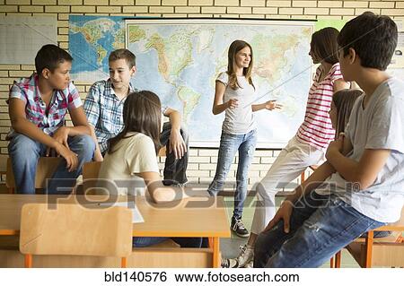 Students talking in classroom View Large Photo Image Stock Photograph - Students talking in classroom. Fotosearch