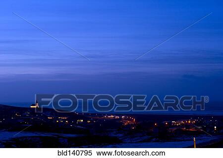 Vik cityscape illuminated at night, Sudhurland, Iceland View Large Photo Image Stock Photography - Vik cityscape illuminated at night, Sudhurland, Iceland. Fotosearch