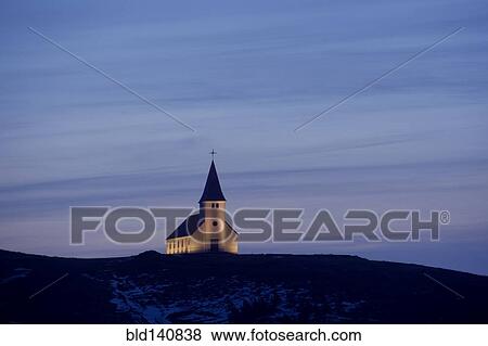 White church illuminated in remote landscape View Large Photo Image Stock Photo - White church illuminated in remote landscape. Fotosearch