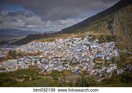 Colorful cityscape in rural valley, Chefchaouen, Morocco View Large Photo Image Stock Photo - Colorful cityscape in rural valley, Chefchaouen, Morocco. Fotosearch