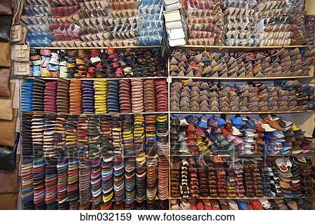 Shoe forms and leather supplies on shelves in tannery View Large Photo Image Stock Photo - Shoe forms and leather supplies on shelves in tannery. Fotosearch