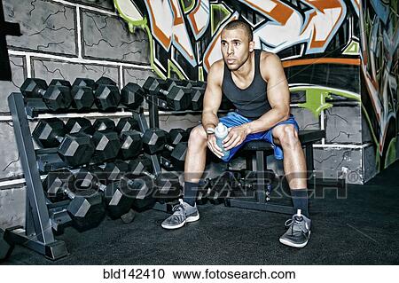 African American man resting in gym View Large Photo Image Stock Image - African American man resting in gym. Fotosearch