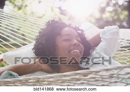 Pictures of African American woman relaxing in hammock bld141868 ...