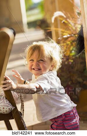 Caucasian baby boy smiling outdoors View Large Photo Image Stock Image - Caucasian baby boy smiling outdoors. Fotosearch