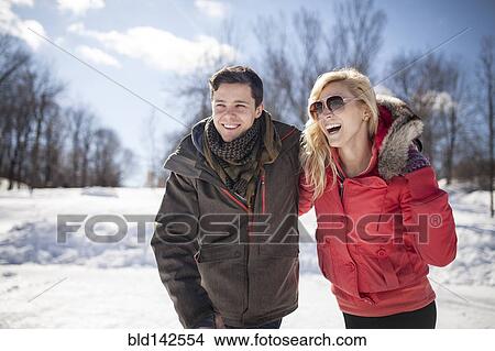Picture - Caucasian couple hugging in winter. Fotosearch