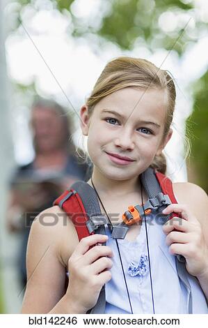 Caucasian girl hiking with backpack View Large Photo Image Stock Photograph - Caucasian girl hiking with backpack. Fotosearch