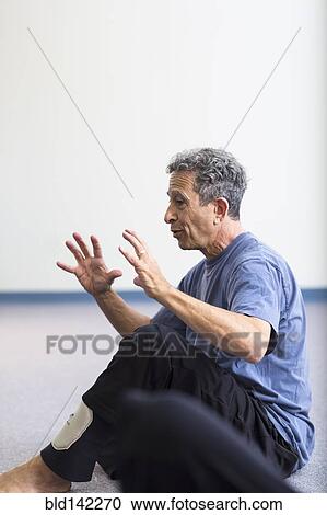 Caucasian teacher gesturing in acting class View Large Photo Image Stock Image - Caucasian teacher gesturing in acting class. Fotosearch