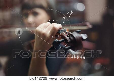 Caucasian woman playing violin overlaid with graphic design View Large Photo Image Stock Photography - Caucasian woman playing violin overlaid with graphic design. Fotosearch