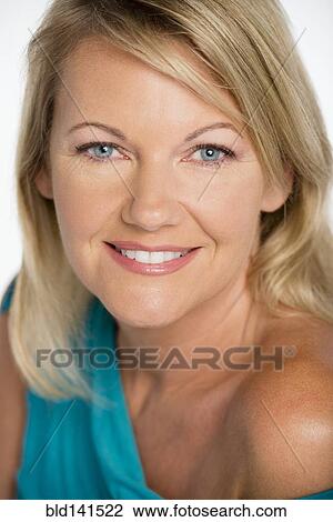 Stock Image - Close up of woman smiling. Fotosearch