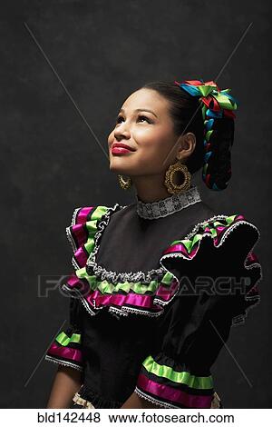 Hispanic teenage girl wearing Jallisco Folkloric dress View Large Photo Image Stock Photo - Hispanic teenage girl wearing Jallisco Folkloric dress. Fotosearch