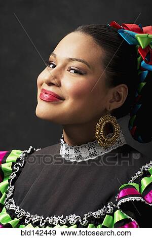 Stock Photo - Hispanic teenage girl wearing Jallisco Folkloric dress. Fotosearch