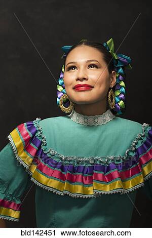 Hispanic teenage girl wearing Puebla Folkloric dress View Large Photo Image Stock Image - Hispanic teenage girl wearing Puebla Folkloric dress. Fotosearch