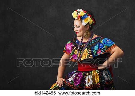 Hispanic woman dancing in Chiapas Folkloric dress View Large Photo Image Stock Photography - Hispanic woman dancing in Chiapas Folkloric dress. Fotosearch