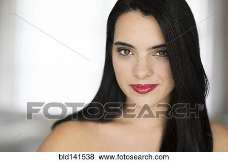 Stock Photo - Hispanic woman smiling. Fotosearch