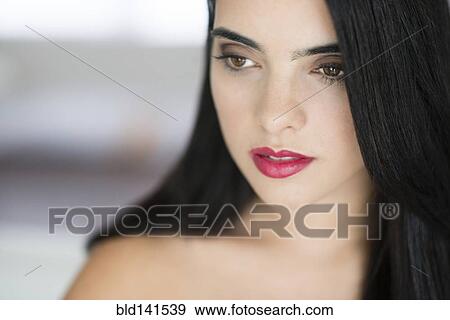 Stock Photo - Hispanic woman smiling. Fotosearch