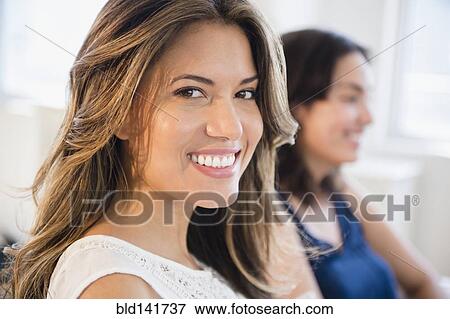 Stock Photo - Hispanic woman smiling. Fotosearch
