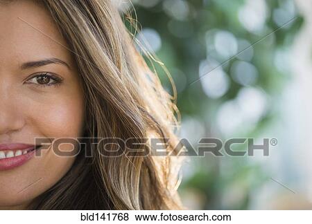 Stock Photo - Hispanic woman smiling. Fotosearch